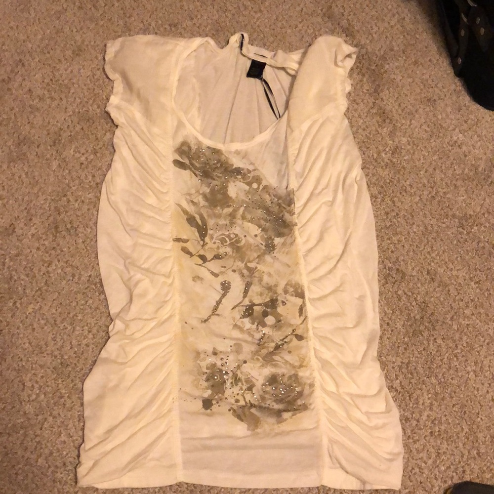 White shirt from buckle.